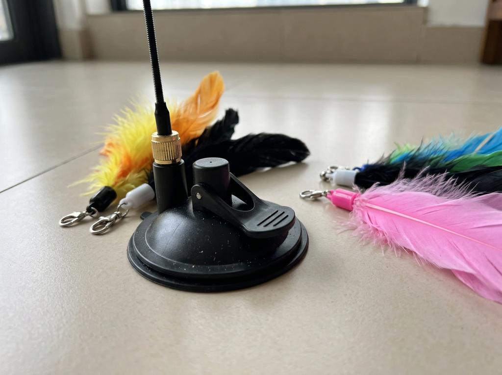 Suction cup base with refill feather attachments