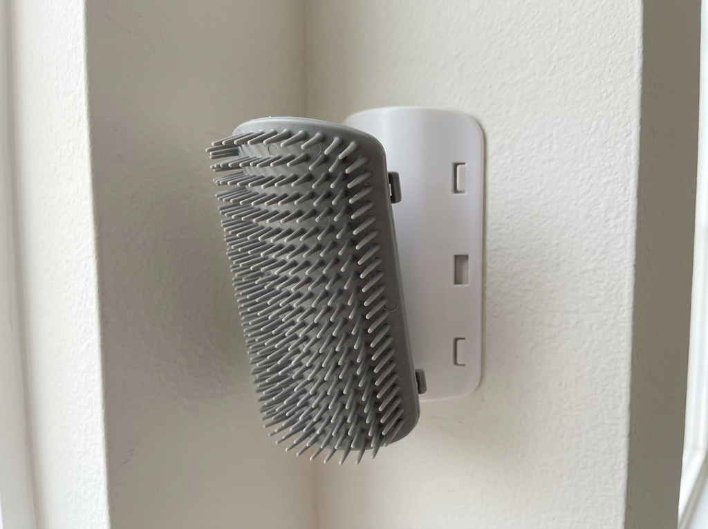 Close-up of the corner groomer bristles and removable base