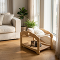 Two cats on a two-tier wooden elevated cat bed in a modern living room